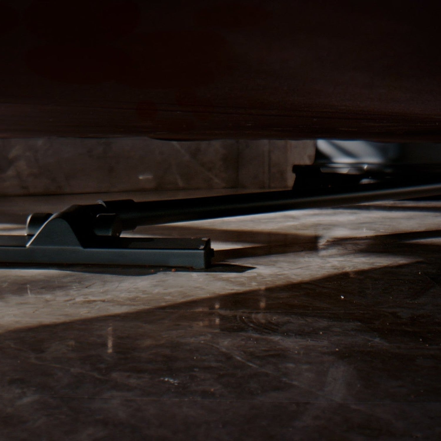PUDU SH1 squeegee cleaning under low furniture