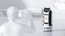 PUDU BellaBot Pro delivery and advertising robot greeting customer with friendly interaction