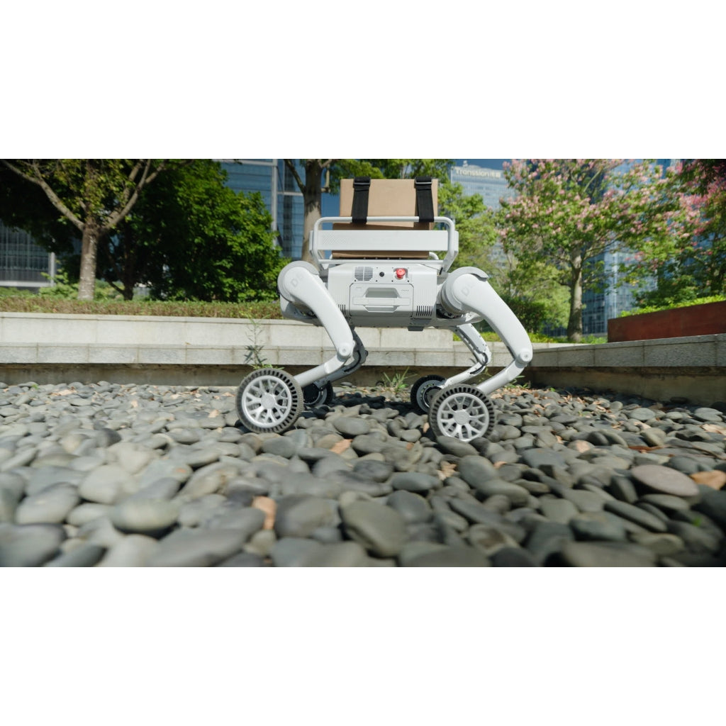 Close-up of PUDU D5 feet navigating loose gravel and rocks with dynamic balancing.