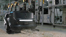 PUDU MT1 AI powered robotic sweeper collecting a bottle