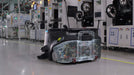 PUDU MT1 AI powered robotic sweeper showing a full collection basket