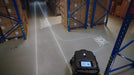 PUDU MT1 AI powered robotic sweeper navigating to collect waste