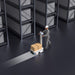 Warehouse worker using PUDU T300 in power-assist mode for easy manual manoeuvring of heavy loads.