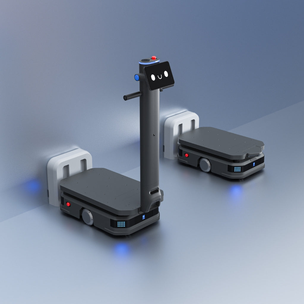 PUDU T600 industrial robot automatically docking at its wall-mounted charging station for 24/7 operation.