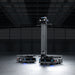 Wide panoramic view of PUDU T600 robots operating autonomously in a large, dimly lit industrial warehouse.