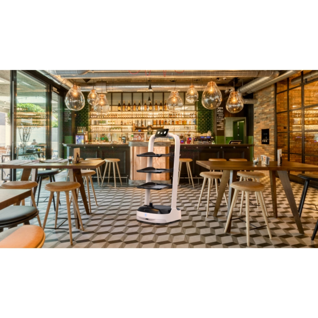 PuduBot 2 delivering food and drinks in a stylish restaurant and leisure venue.